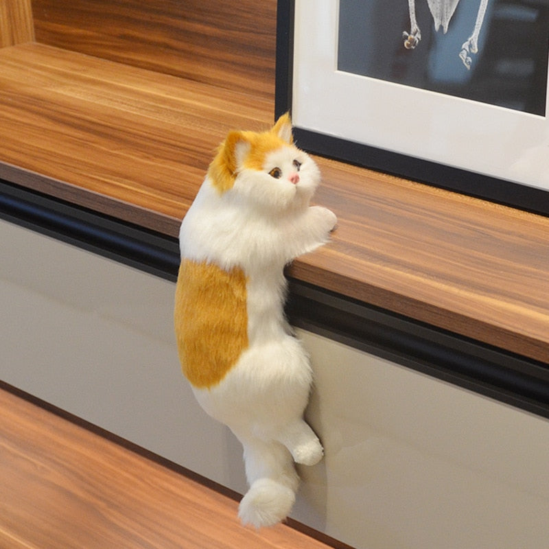 Realistic climbing cat plush